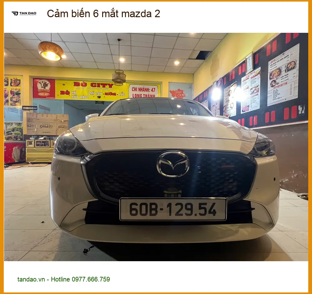 Anh Thành lắp cảm biến 6 mắt Mazda 2 ở Quận 7 tránh va quệt lề đường ảnh thực tế 2