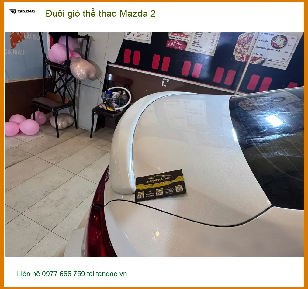 Anh Khang lắp đuôi gió thể thao Mazda 2 tại Quận 11 tăng vẻ năng động ảnh thực tế 3