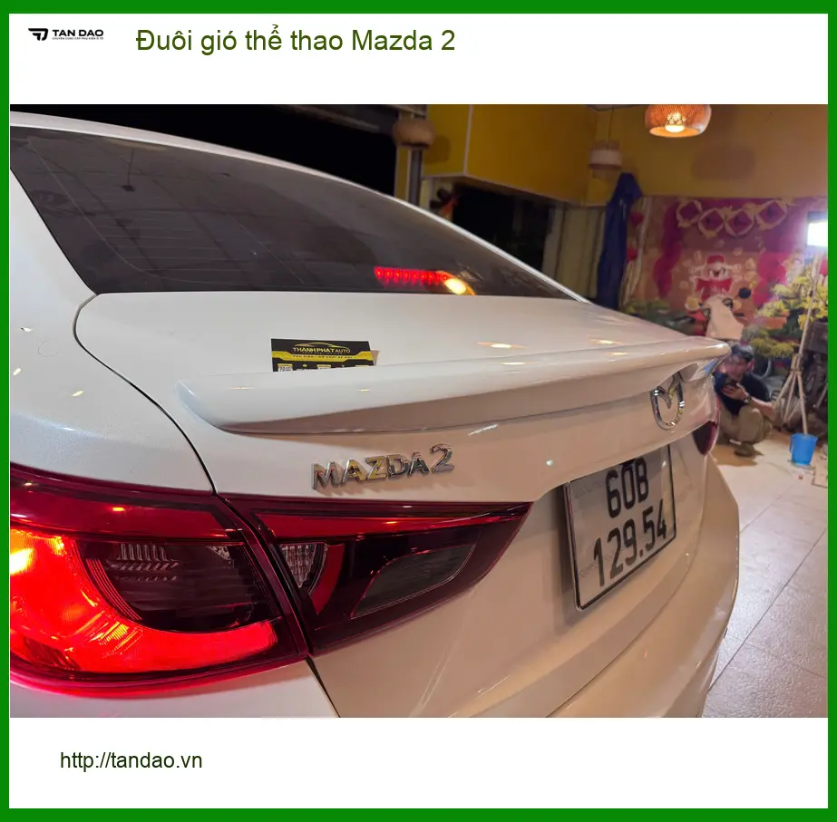 Anh Khang lắp đuôi gió thể thao Mazda 2 tại Quận 11 tăng vẻ năng động ảnh thực tế 4