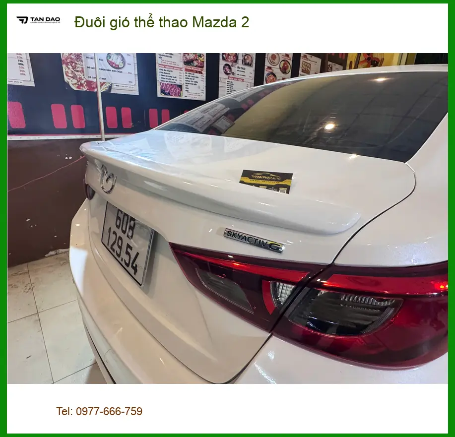 Anh Long lắp đuôi gió thể thao Mazda 2 tại Quận Tân Phú cho xe thêm cá tính.