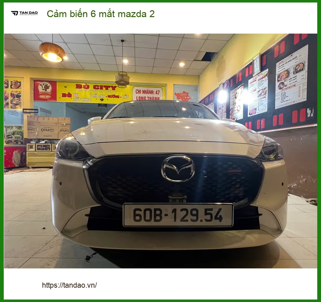 Anh Quang lắp cảm biến 6 mắt Mazda 2 sau va quẹt nhỏ tại Quận 6 ảnh thực tế 2