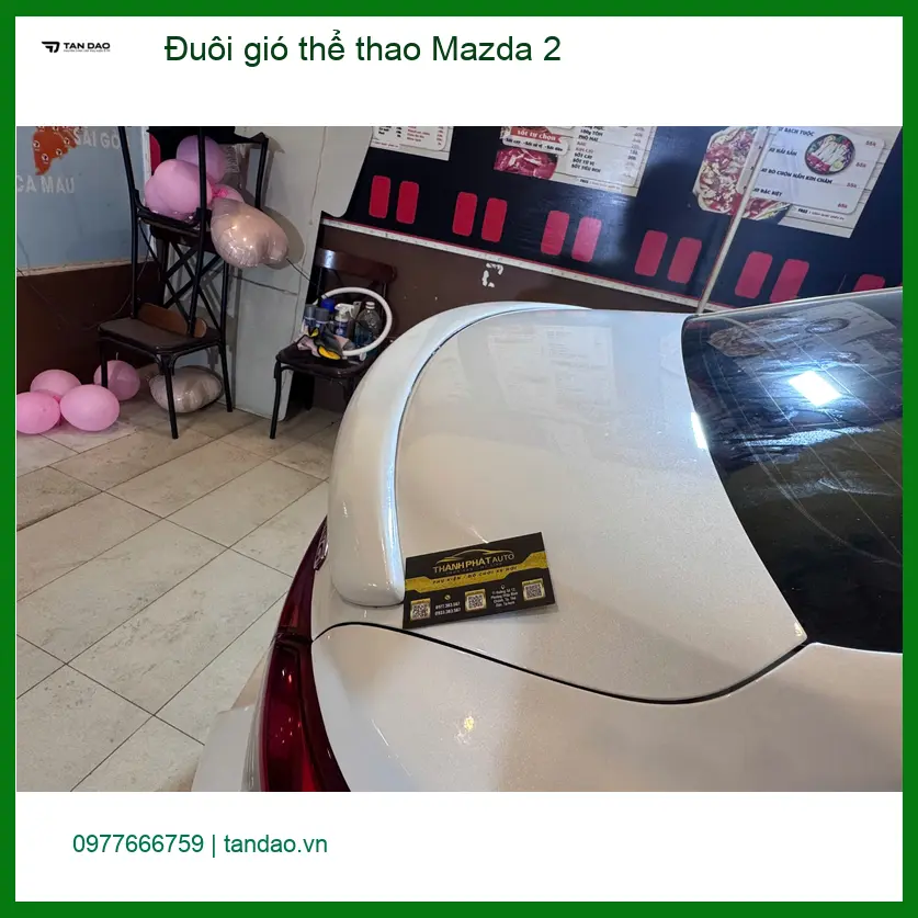 Anh Tùng độ đuôi gió thể thao Mazda 2 tại Quận 12 vì muốn xe thêm nổi bật ảnh thực tế 3