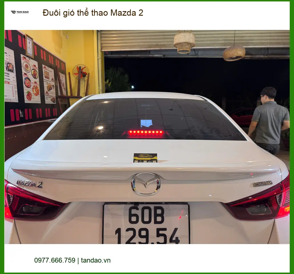 Anh Tùng độ đuôi gió thể thao Mazda 2 tại Quận 12 vì muốn xe thêm nổi bật ảnh thực tế 5