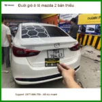 Anh Minh lắp đuôi gió ô tô Mazda 2 bản thiếu tại Quận 2 để xe trông thể thao hơn