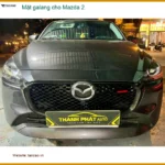 Chị Hương Giang thay mặt galang cho Mazda 2 tại Thủ Đức để xe trông thể thao hơn